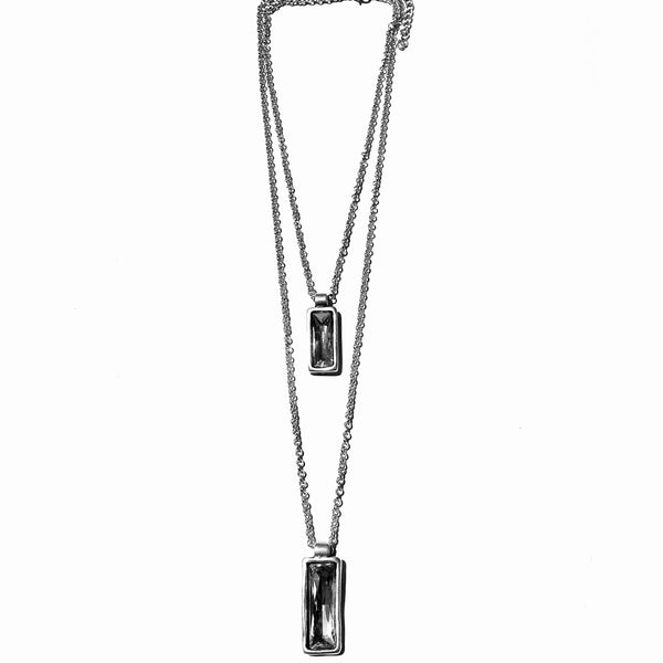Modern Jewlery, sleek by design.  Stunning Necklace ,Silver double metail chain link necklace with crystals embedded in a rectangle shaped pendant filled with a big chunck of clear crystal.  41 cm is the first chain with the second being about 61cm with a 5cm extend chain for added length.  Silver colored metal  necklace is very modern and a great statement piece. Jewlery made in Turkey just for us, and only limited quantities.  We offer free shipping and the best Turkish Jewlery, as shown in this photo